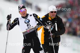24.02.2011, Oslo, Norway (NOR): Kris Freeman (USA), Fischer, Swix, Alpina, Rottefella, needed help to get up  - FIS nordic world ski championships, cross-country, individual sprint, Oslo (NOR). www.nordicfocus.com. © Laiho/NordicFocus. Every downloaded picture is fee-liable.