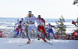 06.03.2011, Oslo, Norway (NOR): top group at the Kapellen backen with Oslo in the background, in front Johan Olsson (SWE), Madshus, Salomon, Leki, Craft  - FIS nordic world ski championships, cross-country, mass  men, Oslo (NOR). www.nordicfocus.com. © Hemmersbach/NordicFocus. Every downloaded picture is fee-liable.