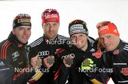 04.03.2011, Oslo, Norway (NOR): Team Germany, l-r: Jens Filbrich (GER), Rossignol, Rottefella, One Way, adidas, Axel Teichmann (GER), Madshus, Rottefella, Swix, adidas, Toko, Franz Goering (GER), Atomic, adidas, Toko, Alpina, Rottefella, Swix, Tobias Angerer (GER), Rossignol, Rottefella, One Way, adidas  - FIS nordic world ski championships, cross-country, medals, Oslo (NOR). www.nordicfocus.com. © Hemmersbach/NordicFocus. Every downloaded picture is fee-liable.