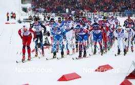 27.02.2011, Oslo, Norway (NOR):  Petter Northug (NOR), Fischer, Swix, Alpina, Rottefella, Skigo leading a big group of skiers - FIS nordic world ski championships, cross-country, pursuit men, Oslo (NOR). www.nordicfocus.com. © Laiho/NordicFocus. Every downloaded picture is fee-liable.