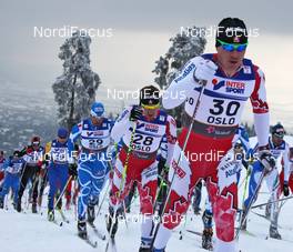 27.02.2011, Oslo, Norway (NOR): group, in front George Grey (CAN), Fischer, behind Ivan Babikov (CAN), Salomon, One Way  - FIS nordic world ski championships, cross-country, pursuit men, Oslo (NOR). www.nordicfocus.com. © Hemmersbach/NordicFocus. Every downloaded picture is fee-liable.