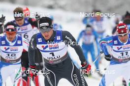 27.02.2011, Oslo, Norway (NOR): group, in front Dario Cologna (SUI), Fischer, Rottefella, Alpina, Swix, Odlo  - FIS nordic world ski championships, cross-country, pursuit men, Oslo (NOR). www.nordicfocus.com. © Hemmersbach/NordicFocus. Every downloaded picture is fee-liable.