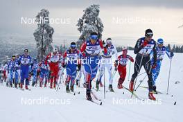 27.02.2011, Oslo, Norway (NOR): group, in front l-r: Alexander Legkov (RUS), Madshus, Rottefella, Swix, adidas and Dario Cologna (SUI), Fischer, Rottefella, Alpina, Swix, Odlo  - FIS nordic world ski championships, cross-country, pursuit men, Oslo (NOR). www.nordicfocus.com. © Hemmersbach/NordicFocus. Every downloaded picture is fee-liable.