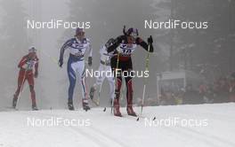 26.02.2011, Oslo, Norway (NOR): group, in front Nicole Fessel (GER), Rossignol, Rottefella, Alpina, One Way, adidas, behind Marianna Longa (ITA), Fischer, Salomon, One Way  - FIS nordic world ski championships, cross-country, pursuit women, Oslo (NOR). www.nordicfocus.com. © Hemmersbach/NordicFocus. Every downloaded picture is fee-liable.