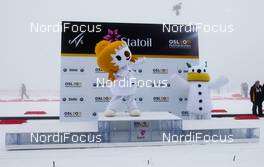 02.03.2011, Oslo, Norway (NOR):  the official mascots (l-r) Fnugg (NOR) on the podium and Ull (NOR) behind - FIS nordic world ski championships, cross-country, team sprint, Oslo (NOR). www.nordicfocus.com. © Laiho/NordicFocus. Every downloaded picture is fee-liable.