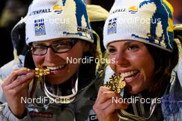 02.03.2011, Oslo, Norway (NOR):  (l-r) Ida Ingemarsdotter (SWE), Rossignol, One Way, Rottefella, Craft and Charlotte Kalla (SWE), Fischer, Swix, Salomon, Craft - FIS nordic world ski championships, cross-country, team sprint, Oslo (NOR). www.nordicfocus.com. © Laiho/NordicFocus. Every downloaded picture is fee-liable.