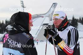 21.02.2011, Oslo, Norway (NOR): l-r: Kuno Schreyl (GER), Headcoach Men, Team Germany and Tim Tscharnke (GER), Fischer, Alpina, Rottefella, Swix, Adidas  - FIS nordic world ski championships, cross-country, training, Oslo (NOR). www.nordicfocus.com. © Hemmersbach/NordicFocus. Every downloaded picture is fee-liable.