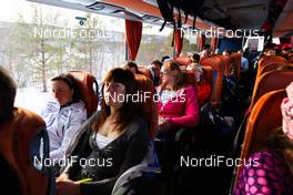 06.04.2011, Inari , Finland (FIN): athlete bus on the way from Tana to Inari (l-r) Melissa Gorra (ITA), Virginia de Martin Topranin (ITA) and Petra Majdic (SLO)   - Tour de Barents 2011, training, Inari (FIN). www.nordicfocus.com. © Laiho/NordicFocus. Every downloaded picture is fee-liable.