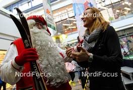 08.04.2011, Rovaniemi, Finland (FIN):  (l-r) Santa Claus (FIN) and Petra Majdic (SLO), Fischer, One Way, Alpina, Rottefella - Tour de Barents 2011, training, Rovaniemi (FIN). www.nordicfocus.com. © Laiho/NordicFocus. Every downloaded picture is fee-liable.