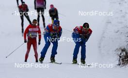 18.11.2011, Sjusjoen, Norway (NOR): (l-r) Lari Lehtonen, (FIN), Fischer, One Way, Rottefella, Craft and the trainer Jussi Piirainen (FIN) testing skis  - FIS world cup cross country, training, Sjusjoen (NOR). www.nordicfocus.com. Â© Laiho/NordicFocus. Every downloaded picture is fee-liable.