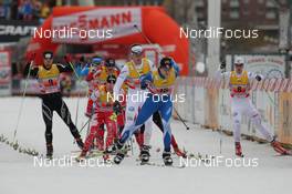 04.12.2011, Duesseldorf, Germany (GER): group, in front Matias Strandvall (FIN), Fischer, Salomon, Swix, Craft, behind Jesper Modin (SWE), Craft, Fischer, Salomon, Swix, behind Drew Goldsack (CAN), Fischer, Rottefella, Alpina, Swix, One Way  - FIS world cup cross-country, team sprint, Duesseldorf (GER). www.nordicfocus.com. © Hemmersbach/NordicFocus. Every downloaded picture is fee-liable.