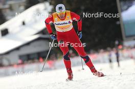 10.12.2011, Davos, Switzerland (SUI): Petter Northug (NOR), Fischer, Rottefella, Alpina, Ski Go, Swix  - FIS world cup cross-country, 30km men, Davos (SUI). www.nordicfocus.com. © Manzoni/NordicFocus. Every downloaded picture is fee-liable.