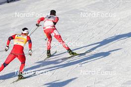 11.12.2011, Davos, Switzerland (SUI): Chandra Crawford (CAN), Fischer, Rottefella, Swix leads Marit Bjoergen (NOR), Fischer, Rottefella, Swix - FIS world cup cross-country, individual sprint, Davos (SUI). www.nordicfocus.com. © Manzoni/NordicFocus. Every downloaded picture is fee-liable.