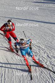 11.12.2011, Davos, Switzerland (SUI): Natalia Matveeva (RUS), Fischer, Rottefella, Alpina, Swix, adidas, Ingvild Flugstad Oestberg (NOR), Madshus, Rottefella, Alpina, Swix - FIS world cup cross-country, individual sprint, Davos (SUI). www.nordicfocus.com. © Manzoni/NordicFocus. Every downloaded picture is fee-liable.