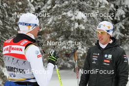 17.12.2011, Rogla, Slovenia (SLO): l-r: Daniel Rickardsson (SWE), Fischer, Salomon, Swix and Marcus Hellner (SWE), Fischer, Salomon, Exel, Craft talking before the race - FIS world cup cross-country, mass men, Rogla (SLO). www.nordicfocus.com. © Hemmersbach/NordicFocus. Every downloaded picture is fee-liable.
