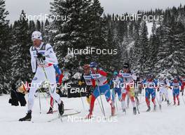 17.12.2011, Rogla, Slovenia (SLO): group, in front: Daniel Rickardsson (SWE), Fischer, Salomon, Swix, behind Maxim Vylegzhanin (RUS), Fischer, Rottefella, Alpina, Swix, adidas and Alex Harvey (CAN), Fischer, Salomon, Swix  - FIS world cup cross-country, mass men, Rogla (SLO). www.nordicfocus.com. © Hemmersbach/NordicFocus. Every downloaded picture is fee-liable.