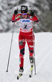 17.12.2011, Rogla, Slovenia (SLO): Therese Johaug (NOR), Fischer, Salomon, Swix  - FIS world cup cross-country, mass women, Rogla (SLO). www.nordicfocus.com. © Hemmersbach/NordicFocus. Every downloaded picture is fee-liable.