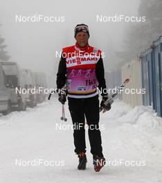16.12.2011, Rogla, Slovenia (SLO): Tor Arne Hetland (NOR), coach of Team Switzerland going out on the tracks - FIS world cup cross-country, training, Rogla (SLO). www.nordicfocus.com. © Hemmersbach/NordicFocus. Every downloaded picture is fee-liable.