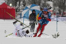 31.12.2011, Oberstdorf, Germany (GER): l-r: Emil Joensson (SWE), Fischer, Salomon, Craft, Swix tumbling, Maxim Vylegzhanin (RUS), Fischer, Rottefella, Alpina, Swix, adidas  - FIS world cup cross-country, tour de ski, individual sprint, Oberstdorf (GER). www.nordicfocus.com. © Hemmersbach/NordicFocus. Every downloaded picture is fee-liable.