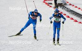 28.02.2011, Oslo, Norway (NOR): change-over, (l-r) Hannu Manninen (FIN), Fischer, Rottefella, Start  and Janne Ryynaenen (FIN), Fischer, One Way, Rottefella  - FIS nordic world ski championships, nordic combined, team HS106/4x5km, Oslo (NOR). www.nordicfocus.com. © Laiho/NordicFocus. Every downloaded picture is fee-liable.