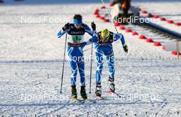 04.03.2011, Oslo, Norway (NOR): chance-over, (r-l) Sebastian Lacroix (FRA), Atomic, Salomon, One Way, Julbo and Maxime Laheurte (FRA), Fischer, Swix, Rottefella, One Way   - FIS nordic world ski championships, nordic combined, team HS134/4x5km, Oslo (NOR). www.nordicfocus.com. © Laiho/NordicFocus. Every downloaded picture is fee-liable.