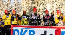 04.12.2011, Lillehammer, Norway (NOR):  german trainers and service taem celebrate Eric Franzel's victory - FIS world cup nordic combined, individual gundersen HS138/10km, Lillehammer (NOR). www.nordicfocus.com. Â© Laiho/NordicFocus. Every downloaded picture is fee-liable.
