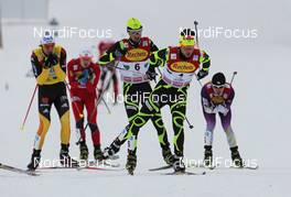 10.12.2011, Ramsau, Austria (AUT): group, in front Jason Lamy-Chappuis (FRA), Salomon, Swix, One Way, behind Maxime Laheurte (FRA), Fischer, Rottefella, One Way, behind Tino Edelmann (GER), Elan, Madshus, Rottefella, adidas - FIS world cup nordic combined, individual gundersen HS98/10km, Ramsau (AUT). www.nordicfocus.com. © Hemmersbach/NordicFocus. Every downloaded picture is fee-liable.