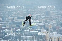 03.01.2011, Innsbruck, Austria (AUT): Michael Uhrmann (GER), Fischer, flying above Innsbruck  - FIS world cup ski jumping, four hills tournament, individual HS130, Innsbruck (AUT). www.nordicfocus.com. Â© Felgenhauer/NordicFocus. Every downloaded picture is fee-liable.