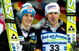 05.02.2011, Oberstdorf, Germany (GER): (l-r) Gregor Schlierenzauer (AUT), Fischer and Martin Koch (AUT), Fischer  - FIS world cup ski jumping, individual HS213, Oberstdorf (GER). www.nordicfocus.com. © Laiho/NordicFocus. Every downloaded picture is fee-liable.