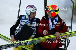 05.02.2011, Oberstdorf, Germany (GER): (l-r) Simon Ammann (SUI), Fischer and Tom Hilde (NOR), Fischer in the ski lift  - FIS world cup ski jumping, individual HS213, Oberstdorf (GER). www.nordicfocus.com. © Laiho/NordicFocus. Every downloaded picture is fee-liable.