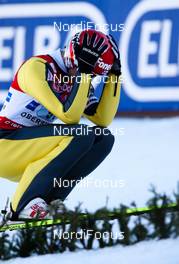 06.02.2011, Oberstdorf, Germany (GER):  disappointed Matti Hautamaeki (FIN), Fischer, holds his head - FIS world cup ski jumping, team HS213, Oberstdorf (GER). www.nordicfocus.com. © Laiho/NordicFocus. Every downloaded picture is fee-liable.