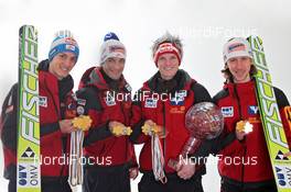 20.03.2011, Planica, Slovenia (SLO): Austrian Ski Jumping Team, Medal Winners Oslo, l-r: Gregor Schlierenzauer (AUT), Fischer, Andreas Kofler (AUT), Fischer, Thomas Morgenstern (AUT), Fischer, Martin Koch (AUT), Fischer  - FIS world cup ski jumping final, cups, Planica (SLO). www.nordicfocus.com. © Hemmersbach/NordicFocus. Every downloaded picture is fee-liable.