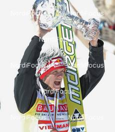 20.03.2011, Planica, Slovenia (SLO): world cup winner Thomas Morgenstern (AUT), Fischer with the cup - FIS world cup ski jumping final, cups, Planica (SLO). www.nordicfocus.com. © Hemmersbach/NordicFocus. Every downloaded picture is fee-liable.