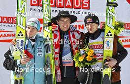 20.03.2011, Planica, Slovenia (SLO): todays podium, l-r: 2nd Robert Kranjec (SLO), Fischer, 1st Kamil Stoch (POL), Fischer, 3rd Adam Malysz (POL), Fischer  - FIS world cup ski jumping final, individual HS215, Planica (SLO). www.nordicfocus.com. © Hemmersbach/NordicFocus. Every downloaded picture is fee-liable.