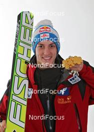 18.03.2011, Planica, Slovenia (SLO): Gregor Schlierenzauer (AUT), Fischer  - FIS world cup ski jumping final, medals, Planica (SLO). www.nordicfocus.com. © Hemmersbach/NordicFocus. Every downloaded picture is fee-liable.