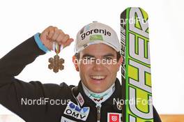 18.03.2011, Planica, Slovenia (SLO): Jernej Damjan (SLO), Fischer  - FIS world cup ski jumping final, medals, Planica (SLO). www.nordicfocus.com. © Hemmersbach/NordicFocus. Every downloaded picture is fee-liable.