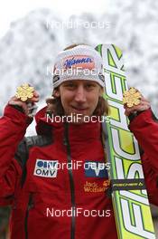 18.03.2011, Planica, Slovenia (SLO): Martin Koch (AUT), Fischer  - FIS world cup ski jumping final, medals, Planica (SLO). www.nordicfocus.com. © Hemmersbach/NordicFocus. Every downloaded picture is fee-liable.