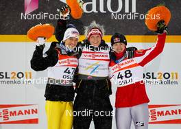26.02.2011, Oslo, Norway (NOR): (l-r) Andreas Kofler (AUT), Fischer, Thomas Morgenstern (AUT), Fischer and Adam Malysz (POL), Fischer  - FIS nordic world ski championships, ski jumping, individual HS106, Oslo (NOR). www.nordicfocus.com. © Laiho/NordicFocus. Every downloaded picture is fee-liable.