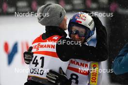 26.02.2011, Oslo, Norway (NOR): (l-r) Kamil Stoch (POL), Fischer congratules Adam Malysz (POL), Fischer  - FIS nordic world ski championships, ski jumping, individual HS106, Oslo (NOR). www.nordicfocus.com. © Laiho/NordicFocus. Every downloaded picture is fee-liable.