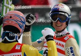 26.02.2011, Oslo, Norway (NOR): (r-l) the winner Thomas Morgenstern (AUT), Fischer was congratulated by his team mate Andreas Kofler (AUT), Fischer  - FIS nordic world ski championships, ski jumping, individual HS106, Oslo (NOR). www.nordicfocus.com. © Laiho/NordicFocus. Every downloaded picture is fee-liable.