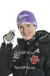 27.02.2011, Oslo, Norway (NOR): Bronce Medal Team; Martin Schmitt (GER) - FIS nordic world ski championships, ski jumping, medals, Oslo (NOR). www.nordicfocus.com. © Hemmersbach/NordicFocus. Every downloaded picture is fee-liable.