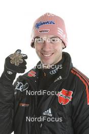 27.02.2011, Oslo, Norway (NOR): Bronce Medal Team; Michael Neumayer (GER), Fischer - FIS nordic world ski championships, ski jumping, medals, Oslo (NOR). www.nordicfocus.com. © Hemmersbach/NordicFocus. Every downloaded picture is fee-liable.