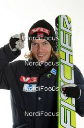 27.02.2011, Oslo, Norway (NOR): Silver Medal Team; Bjoern Einar Romoeren (NOR), Fischer - FIS nordic world ski championships, ski jumping, medals, Oslo (NOR). www.nordicfocus.com. © Hemmersbach/NordicFocus. Every downloaded picture is fee-liable.