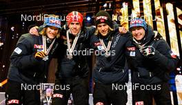 27.02.2011, Oslo, Norway (NOR):  team Norway in the victory ceremony (l-r) Tom Hilde (NOR), Fischer, Anders Bardal (NOR), Fischer, Bjoern Einar Romoeren (NOR), Fischer and Anders Jacobsen (NOR), Fischer - FIS nordic world ski championships, ski jumping, team HS106, Oslo (NOR). www.nordicfocus.com. © Laiho/NordicFocus. Every downloaded picture is fee-liable.