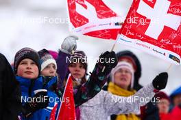 18.12.2011, Engelberg, Switzerland (SUI):  kids with the swiss flags - FIS world cup ski jumping, individual HS137, Engelberg (SUI). www.nordicfocus.com. Â© Laiho/NordicFocus. Every downloaded picture is fee-liable.