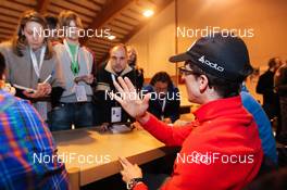 16.12.2011, Engelberg, Switzerland (SUI): Simon Ammann (SUI) giving an interview to the journalists  - FIS world cup ski jumping, training, Engelberg (SUI). www.nordicfocus.com. Â© Laiho/NordicFocus. Every downloaded picture is fee-liable.