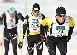 22.01.2010, Lienz, Austria (AUT): Martin Sutter (AUT), Fischer Racing Team, ahead of Viktor Novotny (CZE), Fischer  - Dolomiten Classicrace, Lienz (AUT). www.nordicfocus.com. © Felgenhauer/NordicFocus. Every downloaded picture is fee-liable.