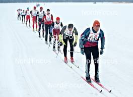 12.-13.02.2011, St. Johann, Austria (AUT): a long row of slower racers on the track - Int. Tiroler Koasalauf, St. Johann (AUT). www.nordicfocus.com. © Felgenhauer/NordicFocus. Every downloaded picture is fee-liable.