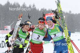 15.01.2012, Nove Mesto, Czech Republic (CZE): L-R: Marie Laure Brunet (FRA), Rossignol, Rottefella, Swix, Tora Berger (NOR), Fischer, Rottefella, Odlo, Helena Ekholm (SWE), Fischer, Rottefella, Leki, adidas - IBU world cup biathlon, pursuit women, Nove Mesto (CZE). www.nordicfocus.com. © Manzoni/NordicFocus. Every downloaded picture is fee-liable.