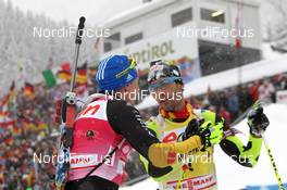 21.01.2012, Antholz, Italy (ITA): Andreas Birnbacher (GER), Fischer, Rottefella, Alpina, Leki, adidas, Martin Fourcade (FRA), Rossignol, Rottefella, OneWay, Odlo - IBU world cup biathlon, mass men, Antholz (ITA). www.nordicfocus.com. © Manzoni/NordicFocus. Every downloaded picture is fee-liable.